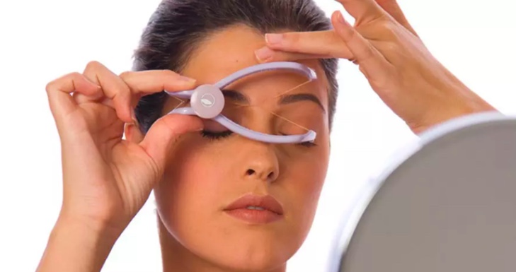 ماكينة إزالة الشعر بالفتلة